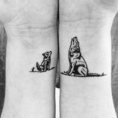 two small tattoos on the wrist of people, one with a wolf and another with a dog