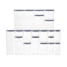 six clear storage bins with lids on each side and one empty container in the middle