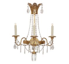 an antique chandelier with crystal drops