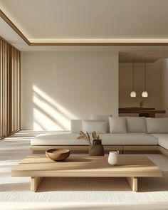 a modern living room with white couches and wooden coffee table in front of large windows