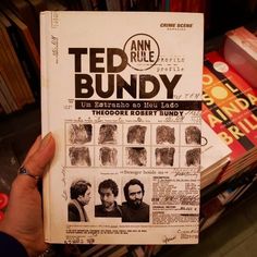 a person holding up a book about ted bundy