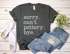 sorry cant pottery bye shirt, pottery tshirt, pottery gifts, pottery tee, pottery lover, ceramicist shirts, gift for potter UNISEX T-SHIRTS Short sleeve Unisex T-shirt - 100% combed and ring-spun cotton (fiber content may vary for different colors) - Light fabric - Tear away label - Runs true to size SIZING AND COLORS - Please refer to size chart on the listing photos in every listing for a detailed sizing chart with measurements. - We use soft and fitted unisex T-shirts from Bella Canvas that a Pottery Clothes, Pottery Gifts Blanket Creek Pottery, Pottery Tshirt, Literary Style Cotton T-shirt With Relaxed Fit, Coffee Bar Party, Stoneware Mugs Blanket Creek Pottery, Bar Party, Pottery Gifts, Sizing Chart