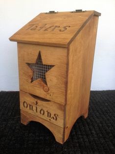 an old wooden box with a star on the front and bottom that says, bottoms