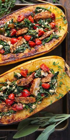 Greek-Inspired Spaghetti Squash (two halves) with Chicken, Tomatoes, Spinach, and Feta Cheese - on a baking sheet. Spaghetti Squash With Chicken, Spaghetti Squash Recipes Chicken, Healthy Squash Recipes, Stuffed Spaghetti Squash, Chicken Tomatoes, Best Thanksgiving Side Dishes, Feta Chicken