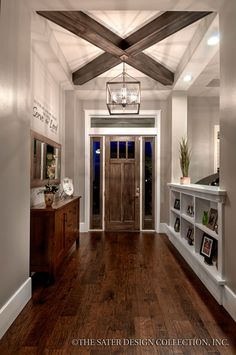 the interior of a house with wood floors and white walls, is shown on an instagram page