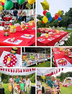 some people are sitting at a red table with balloons and food on it while others stand around the table