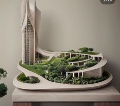 a model of a building with trees and bushes on top