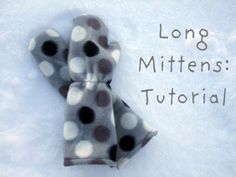 a pair of mittens sitting in the snow with text overlay that reads long mittens