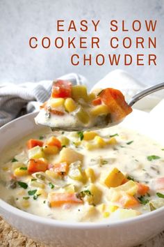 a spoonful of easy slow cooker corn chowder in a white bowl with text overlay