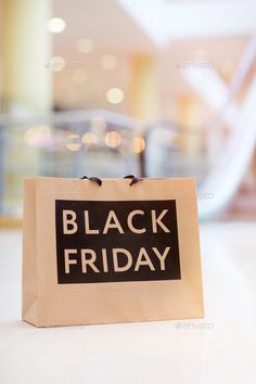 a black friday shopping bag sitting on top of a table