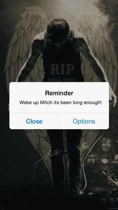 an image of a man with wings on his back and the text reminder wake up mitchell, it's been long enough