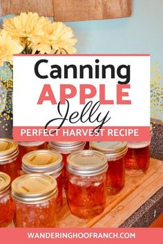 canning apple jelly perfect harvest recipe on a wooden cutting board with flowers in the background