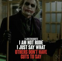 the joker is holding two wooden sticks and looking at the camera with a quote on it