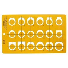 a yellow ruler with white circles and numbers on the front, in half circle shapes