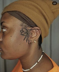 Back Of Both Elbows Tattoo, Color Tattoo Brown Skin, Face Tattoos For Black Women, Face Tattoo Black Women, Floral Face Tattoo, Tattoos On Black Women Dark Skin, Afrocentric Tattoos For Women, Knew Tattoos, Black Woman Tattoo