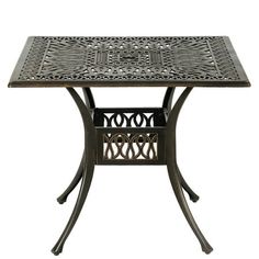 an outdoor table with intricate design on the top and metal frame, against a white background