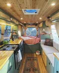 the interior of an rv with wood paneling