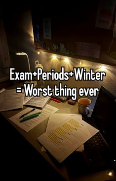 a desk with some papers on it and the words exam periods winter worst thing ever