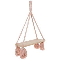 a wooden shelf with three tassels hanging from it's sides and two long ropes