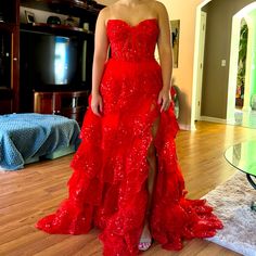 This Gorgeous Red Layered Lace And Sequin Formal Dress Was Worn To Florida National American Miss 2024. Contestant Made It To The Finals In This Lovely Dress. It Is A Stunner! Was Altered To Fit: Bust 34c Or 36b, Waist 29, The Model Is 5’5 In Heals. Original Price Was 150.00 Plus $700 Alterations Red Strapless Sequin Evening Dress, Glamorous Sleeveless Red Carpet Gown, Fitted Sleeveless Red Carpet Evening Dress, Sleeveless Sequin Gown For Red Carpet, Fitted Sleeveless Evening Dress For Red Carpet, Red Sleeveless Gown With Ruffles, Red Sleeveless Ruffled Gown, Sleeveless Dresses For Prom Season And Red Carpet, Red Carpet Sleeveless Dresses For Prom Season