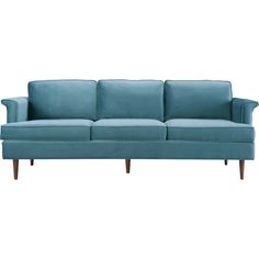 a blue couch sitting on top of a white floor