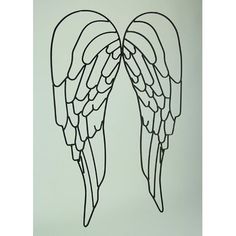 two angel wings facing each other on a white background