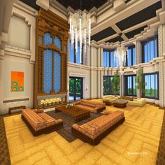 a large living room with couches and chandelier hanging from it's ceiling