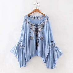 pretty top!i love it! Bell Sleeve Tops, Flared Sleeves Top, Blue Embroidery, Tie Front Blouse, Loose Fitting Tops, Bell Sleeve Blouse, Loose Blouse, Loose Tops, Blue Top