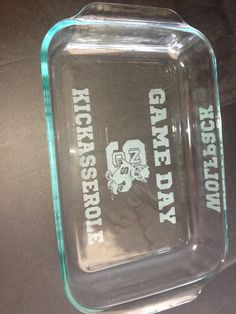 an empty glass tray with the words kentucky state university on it's bottom and inside