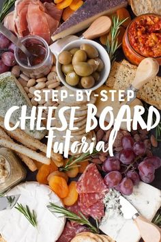 the cheese board is full of different types of meats, cheese and olives