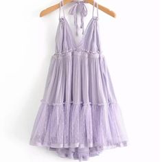 Lavender Swiss Dot Chiffon Ruffled Tiered Layer Halter Babydoll Mini Dress. Light Airy Gauzy Crepe Material. Size Fit: Small: 0-4 Medium: 4-6 Large: 8-10 Measurements: Small: Bust: 34.6" Length: 33" Medium: Bust: 36.2" Length: 33.4" Large: Bust: 37.7" Length: 33.8" Strapless Beach Dress, Outfits To Wear To Work, Date Outfit Ideas, Backless Dress Summer, Boho Mode, Goth Vintage, Eras Tour Outfit, Neck Deep, Eras Tour Outfits