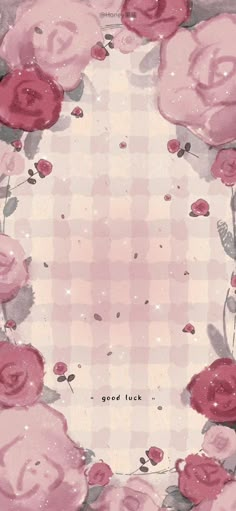 pink roses are arranged in the shape of a circle on a checkered tablecloth