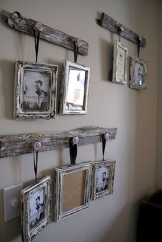 some old frames are hanging on the wall