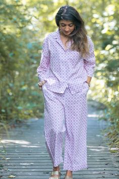 There is a lot to love about these chequered pyjama set,if you are fan of Japanese design then these pjs will not disappoint you! Made with the softest organic cotton. The arm and leg length is shorter than more conventional pjs but they look fabulous and quirky. The top has a boxy body with 3/4 wider sleeves and trousers are cropped slightly above the ankle length. Organic cotton is so soft and is known for its breathable and lightweight quality keeps you cool in summer and toasty in winter Features  - Pure soft cotton  - Vegan product  - Lightweight and breathable  - Elastic waist with drawstring  - Button closure  - Straight full length trousers  - Gorgeous print available in two colours  - Generously sized for comfort  - Washes and dries quickly  - Ethically made in India - Machine was Comfortable Relaxed Fit Pajama Party Sets, Comfortable Matching Sleepwear Set For Spring, Comfortable Matching Set Sleepwear For Spring, Pink Cotton Relaxed Fit Sets, Pink Cotton Sets With Relaxed Fit, Pink Relaxed Fit Cotton Set, Cotton Relaxed Fit Pajama Sets, Summer Bedtime Sets With Long Pants, Cotton Sleep Sets With Long Pants