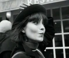 black and white photograph of a woman wearing a hat