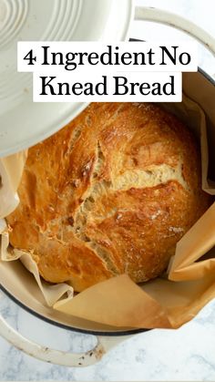 a loaf of bread sitting inside of a pot