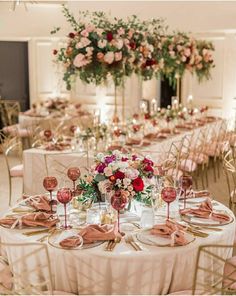 the tables are set with wine glasses and place settings