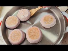 some kind of food that is in a pan on the stove top and ready to be cooked