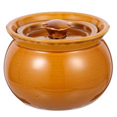 a large brown pot with a lid on it's side, filled with water