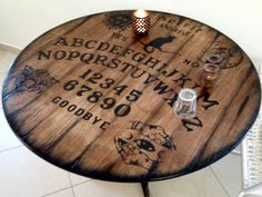 a wooden table with writing on it