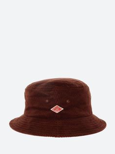 Danton bucket hat made from a thick ridge corduroy and finished with the brand's signature diamond motif on the front. Bucket hat Woven logo on the front Adjustable on the inside Brim length: 5.5cm Materials 100% cotton Size Guide One size fits most. For additional size information, please visit our size guide or contact Customer Service at mailorder@gravitypope.com Corduroy Bucket Hat, Workwear Brands, French Workwear, Japanese Design, Hat Making, Traditional Style, Bucket Hat, Size Guide, Customer Service