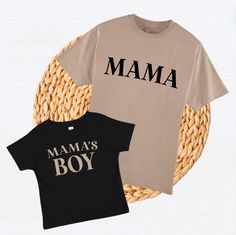 Celebrate the unbreakable bond between mother and son with our 'Mama’s Boy' and 'Mama' Black and Tan Matching Shirts! Crafted from soft and breathable cotton, these matching shirts are designed to ensure comfort and style for both mom and her little one. The classic black and tan colors add a touch of elegance and versatility, perfect for family outings, special occasions, or casual days together. Whether you're capturing precious moments in photos or simply enjoying quality time, our matching s Mom And Son Matching Shirts, Mommy And Son Shirts, Mom And Son Outfits, Wedding Bottle Labels, Birthday Wine Glasses, Christmas Wine Glasses, Christmas Baby Announcement, Wedding Wine Glasses, Mom And Son