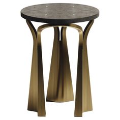 a round table with two metal legs and a marble top