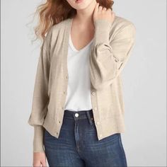 This Classic Yet Fashionable Button Down Cardigan Is Perfect For Cool Summer Night Or Fall. It Features V-Neck With Long Balloon Sleeves With Rib-Knit Cuffs, Rib-Knit Hem And Button-Front (Button Color Same As Material).Straight Silhouette With An Easy Fit That Hits At The Hip. 100% Merino Wool Color: Oatmeal Heather (Similar To Tan). Everyday Fall Outerwear By Gap, Gap Fall Outerwear For Everyday, Classic Gap Cardigan For Fall, Classic Gap Fall Cardigan, Gap Sweater For Spring Layering, Gap V-neck Fall Sweater, Gap Fall Top With Button Closure, Classic Gap Tops For Fall, Casual V-neck Sweater By Gap