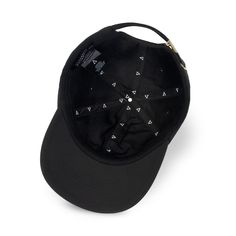 a black hat with white triangles on it