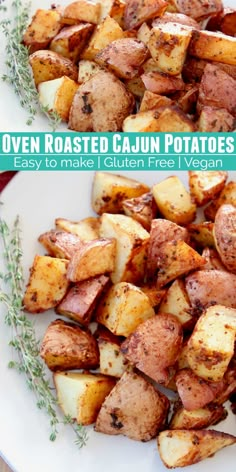 two plates filled with cooked cajun potatoes on top of a wooden table next to an oven