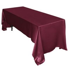 a long table covered with a maroon cloth