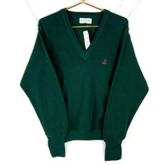 Vintage Izod Grandpa Knit Sweater Medium Green V-Neck New Old Stock 90s Size/Measurements (Based in inches) Size - Medium Pit to pit - 22" Length - 25.5" Shoulder to cuff - 28" Condition / Details Discoloration mark on the back Combined Shipping: We provide combined shipping, please contact us for a quote Gradpa Sweater, V Neck Green Sweater, Oversized Green V-neck Sweater, 90s Green Crew Neck Sweater, Retro Green V-neck Sweater, Classic Green Long Sleeve V-neck Sweater, Mens Jumpers, Pullover Outfit, Knit Sweater