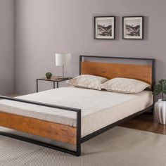 the bed frame is made with wood and metal