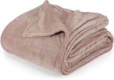 a blanket is folded on top of each other